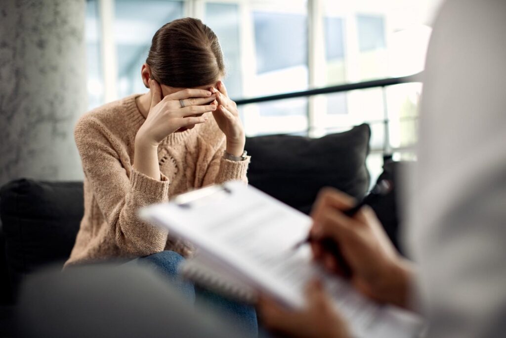 depressed-woman-having-psychotherapy-session-doctor-s-office1